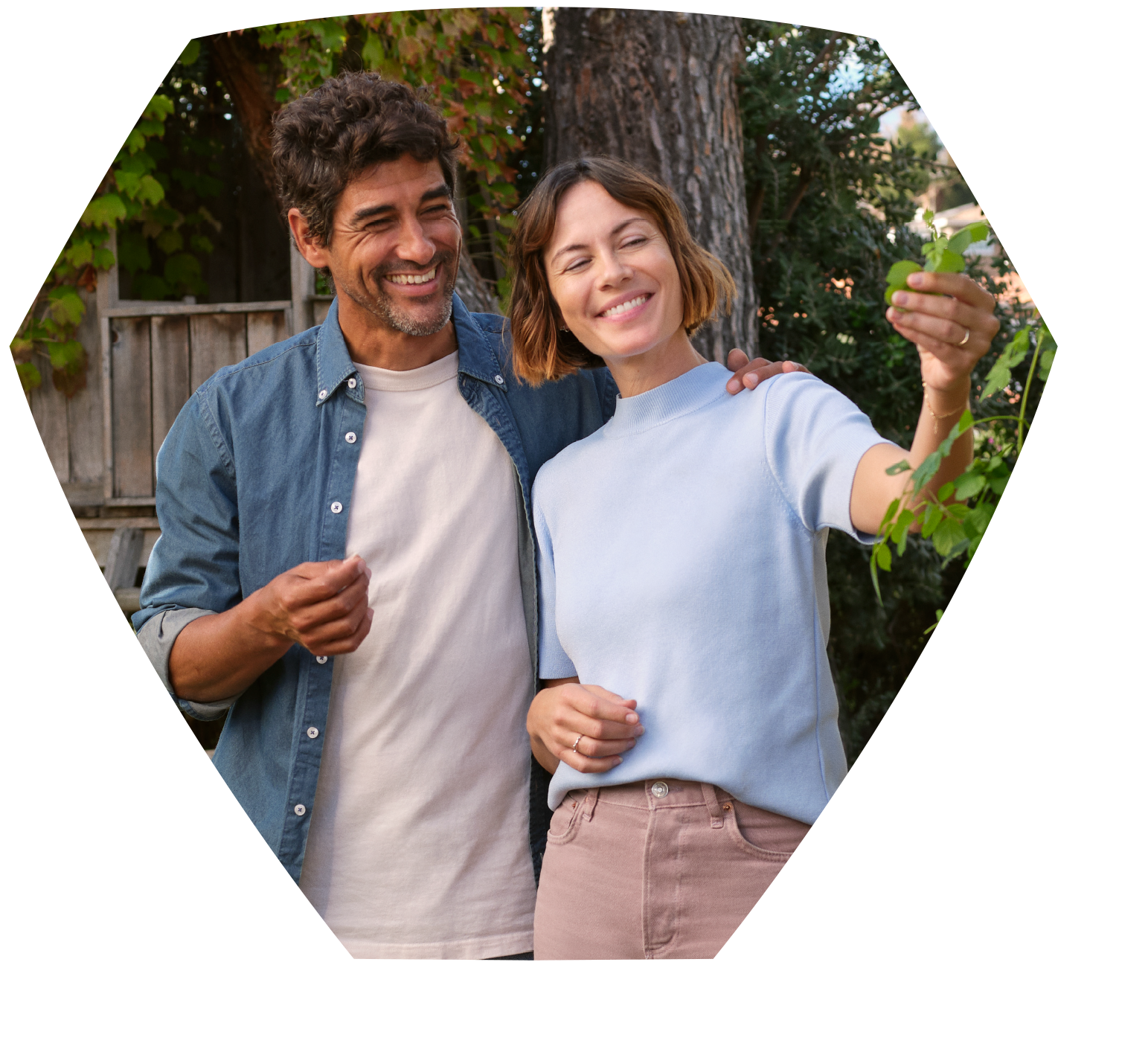 Man and woman smiling outdoors
